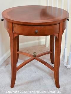 Bombay Company Round Bookmatched Veneer Side Table with Tapered Legs and Four Small Sliver Drawers. 24"D x 26"T.