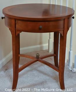 Bombay Company Round Bookmatched Veneer Side Table with Tapered Legs and Four Small Sliver Drawers. 24"D x 26"T.