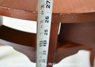 Bombay Company Round Bookmatched Veneer Side Table with Tapered Legs and Four Small Sliver Drawers. 24"D x 26"T.