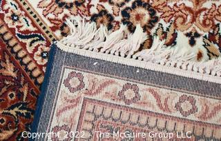 Machine Made Rug with Medallion Center and Border on Brown Ground.  105" x 145" 