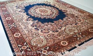 Machine Made Rug with Medallion Center and Border on Brown Ground.  105" x 145" 