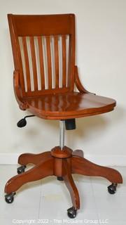 Wood Bankers Lady’s Oak Swivel Desk Chair.