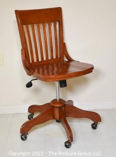 Wood Bankers Lady’s Oak Swivel Desk Chair.