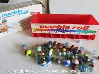 Vintage "Marble Roll" game with marbles and box