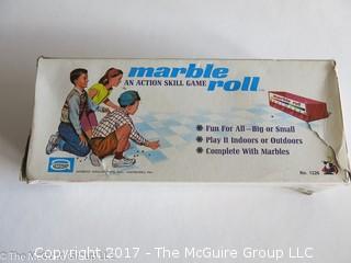 Vintage "Marble Roll" game with marbles and box