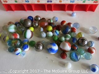 Vintage "Marble Roll" game with marbles and box