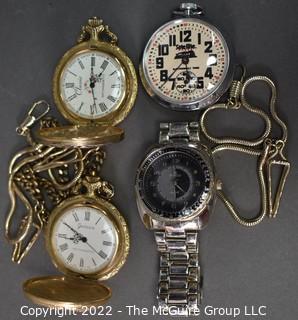 Collection of pocket watches and watch fobs