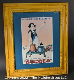 Framed Reproduction French Advertisement for Success Cooking Fuel by the Artist Joseph Stall.  Measures 24 x 28"