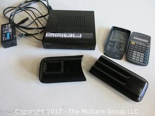 Eclectic Collection including Texas Instruments (TI-30XA) Calculator; leather (3) cigar pouch with cutter; and SONY WLAN Network Media Player SMP-N100