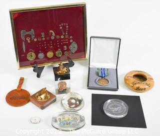 Eclectic grouping including glass paperweights and military medal in presentation box 