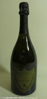 1982 Dom Perignon:  According to the Wine Spectator; WS93 "Seductive and wonderfully balanced, crisp yet it caresses the palate. Has a very complex toasted bread and buttery croissant character along with some nutmeg, spice, chocolate and vanilla notes. At its peak, so drink and enjoy.--Dom Pérignon" 