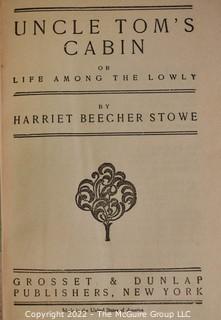 (3) Books including Uncle Tom's Cabin by Harriet Beecher Stowe. Grosset and Dunlap