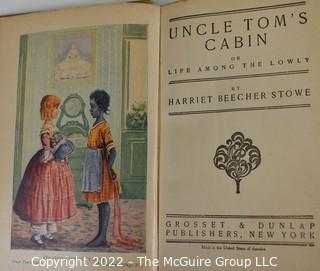 (3) Books including Uncle Tom's Cabin by Harriet Beecher Stowe. Grosset and Dunlap