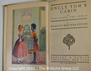 (3) Books including Uncle Tom's Cabin by Harriet Beecher Stowe. Grosset and Dunlap