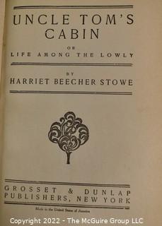 (3) Books including Uncle Tom's Cabin by Harriet Beecher Stowe. Grosset and Dunlap