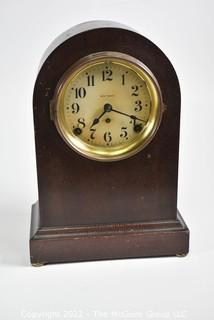 Seth Thomas Chiming Mantle Clock with key.  Works.