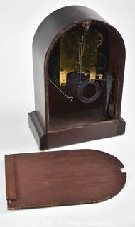 Seth Thomas Chiming Mantle Clock with key.  Works.