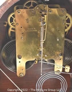 Seth Thomas Chiming Mantle Clock with key.  Works.