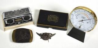 Collection Including Solid Bronze Belt Buckle, TASCO Opera Glasses, St. Christopher Pilots Wings and Desk Hygrometer 