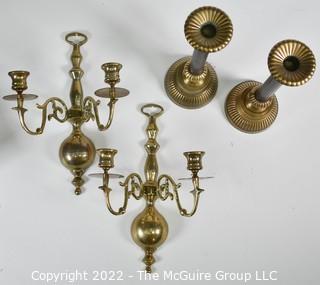 Pair of wall mount brass candle sconces and pair of candlesticks