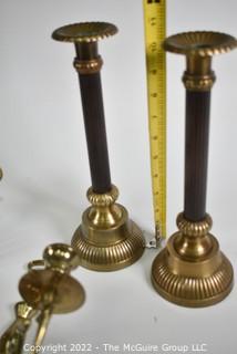 Pair of wall mount brass candle sconces and pair of candlesticks