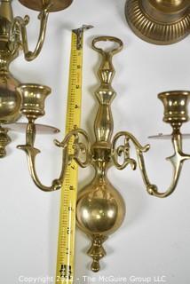 Pair of wall mount brass candle sconces and pair of candlesticks