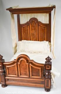 SALESMAN SAMPLE. Miniature (18"L x 19" Tall) Antique Inlaid Mahogany Half Tester Canopy Bed with Bed Linens and Draperies, Made by Edward Stott (1838 - 1881) Cabinet Maker and Upholsterer, 110 Yorkshire Street, Rochdale, Manchester UK. Measures 11" x 18" x 19". (NOTE: This Lot is part of a set (24RH, 25RH, 30RH, 30RHA, 31RH, 32RH).  Lot 60 RHA consists of the ENTIRE SET OF 6 LOTS.  If the high bid for Lot 60RHA exceeds the sum of High bids for (24RH, 25RH, 30RH, 30RHA, 31RH, 32RH), they will be sold as a set.  If you have questions about the process, text David at 202-441-5446