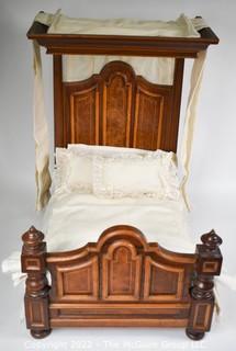 SALESMAN SAMPLE. Miniature (18"L x 19" Tall) Antique Inlaid Mahogany Half Tester Canopy Bed with Bed Linens and Draperies, Made by Edward Stott (1838 - 1881) Cabinet Maker and Upholsterer, 110 Yorkshire Street, Rochdale, Manchester UK. Measures 11" x 18" x 19". (NOTE: This Lot is part of a set (24RH, 25RH, 30RH, 30RHA, 31RH, 32RH).  Lot 60 RHA consists of the ENTIRE SET OF 6 LOTS.  If the high bid for Lot 60RHA exceeds the sum of High bids for (24RH, 25RH, 30RH, 30RHA, 31RH, 32RH), they will be sold as a set.  If you have questions about the process, text David at 202-441-5446