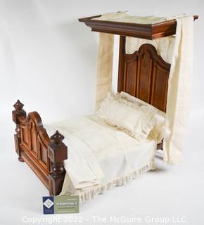 SALESMAN SAMPLE. Miniature (18"L x 19" Tall) Antique Inlaid Mahogany Half Tester Canopy Bed with Bed Linens and Draperies, Made by Edward Stott (1838 - 1881) Cabinet Maker and Upholsterer, 110 Yorkshire Street, Rochdale, Manchester UK. Measures 11" x 18" x 19". (NOTE: This Lot is part of a set (24RH, 25RH, 30RH, 30RHA, 31RH, 32RH).  Lot 60 RHA consists of the ENTIRE SET OF 6 LOTS.  If the high bid for Lot 60RHA exceeds the sum of High bids for (24RH, 25RH, 30RH, 30RHA, 31RH, 32RH), they will be sold as a set.  If you have questions about the process, text David at 202-441-5446