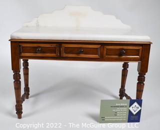 SALESMAN SAMPLE. Miniature (7 1/2 inches tall) Antique Victorian Marble Top Wash Stand or Vanity with Three Inlaid Drawers and Turned Legs, Made by Edward Stott (1838 - 1881) Cabinet Maker and Upholsterer, 110 Yorkshire Street, Rochdale, Manchester UK.  Measures 5" x 9" x 11". (NOTE: This Lot is part of a set (24RH, 25RH, 30RH, 30RHA, 31RH, 32RH).  Lot 60 RHA consists of the ENTIRE SET OF 6 LOTS. If the high bid for Lot 60RHA exceeds the sum of High bids for (24RH, 25RH, 30RH, 30RHA, 31RH, 32RH), they will be sold as a set.  If you have questions about the process, text David at 202-441-5446