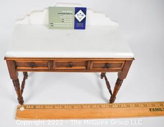 SALESMAN SAMPLE. Miniature (7 1/2 inches tall) Antique Victorian Marble Top Wash Stand or Vanity with Three Inlaid Drawers and Turned Legs, Made by Edward Stott (1838 - 1881) Cabinet Maker and Upholsterer, 110 Yorkshire Street, Rochdale, Manchester UK.  Measures 5" x 9" x 11". (NOTE: This Lot is part of a set (24RH, 25RH, 30RH, 30RHA, 31RH, 32RH).  Lot 60 RHA consists of the ENTIRE SET OF 6 LOTS. If the high bid for Lot 60RHA exceeds the sum of High bids for (24RH, 25RH, 30RH, 30RHA, 31RH, 32RH), they will be sold as a set.  If you have questions about the process, text David at 202-441-5446