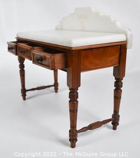 SALESMAN SAMPLE. Miniature (7 1/2 inches tall) Antique Victorian Marble Top Wash Stand or Vanity with Three Inlaid Drawers and Turned Legs, Made by Edward Stott (1838 - 1881) Cabinet Maker and Upholsterer, 110 Yorkshire Street, Rochdale, Manchester UK.  Measures 5" x 9" x 11". (NOTE: This Lot is part of a set (24RH, 25RH, 30RH, 30RHA, 31RH, 32RH).  Lot 60 RHA consists of the ENTIRE SET OF 6 LOTS. If the high bid for Lot 60RHA exceeds the sum of High bids for (24RH, 25RH, 30RH, 30RHA, 31RH, 32RH), they will be sold as a set.  If you have questions about the process, text David at 202-441-5446