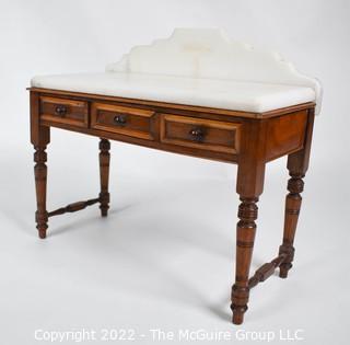 SALESMAN SAMPLE. Miniature (7 1/2 inches tall) Antique Victorian Marble Top Wash Stand or Vanity with Three Inlaid Drawers and Turned Legs, Made by Edward Stott (1838 - 1881) Cabinet Maker and Upholsterer, 110 Yorkshire Street, Rochdale, Manchester UK.  Measures 5" x 9" x 11". (NOTE: This Lot is part of a set (24RH, 25RH, 30RH, 30RHA, 31RH, 32RH).  Lot 60 RHA consists of the ENTIRE SET OF 6 LOTS. If the high bid for Lot 60RHA exceeds the sum of High bids for (24RH, 25RH, 30RH, 30RHA, 31RH, 32RH), they will be sold as a set.  If you have questions about the process, text David at 202-441-5446