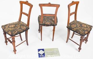 SALESMAN SAMPLE. Three Miniature (7 1/2 inches tall) Antique Dining Chairs with Inlaid Backs and Upholstered Seats, Made by Edward Stott (1838 - 1881) Cabinet Maker and Upholsterer, 110 Yorkshire Street, Rochdale, Manchester UK.  Each measure 8"tall.  One has repairs. (NOTE: This Lot is part of a set (24RH, 25RH, 30RH, 30RHA, 31RH, 32RH).  Lot 60 RHA consists of the ENTIRE SET OF 6 LOTS.  If the high bid for Lot 60RHA exceeds the sum of High bids for (24RH, 25RH, 30RH, 30RHA, 31RH, 32RH), they will be sold as a set.  If you have questions about the process, text David at 202-441-5446