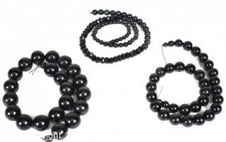 Three (3) Strands of Polished Onyx Beads.