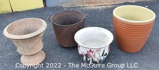 Four (4) Garden Planters Made of Ceramic, Cement, Porcelain and Cast Iron Pot (with cracks)