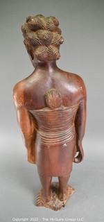 Primitive Hand Carved Wooden Tribal Statue of Women with Baby Strapped to Her Back.  Measures 24" tall.  Ethnographic