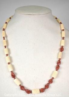 Turned Bone with Red Jasper Bead Necklace.  24" long.