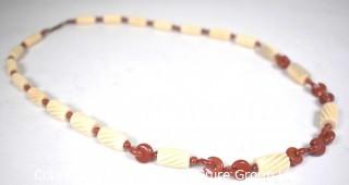 Turned Bone with Red Jasper Bead Necklace.  24" long.