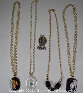 Group of Gold Tone Necklace with Pendants.