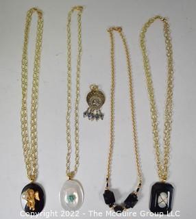 Group of Gold Tone Necklace with Pendants.