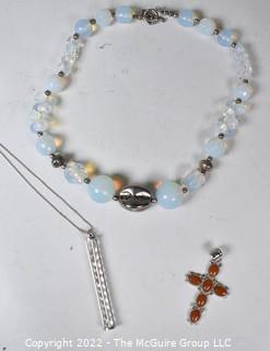 Rainbow Moonstone Bead Necklace, Stone Inlaid Cross Pendant and Stacked Crystal Pendant on Chain Necklace.