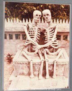 Black & White Photograph Entitled "Together Forever" by Ed Streeky. Sculpture of Skeleton in Nong Khai Buddha Garden, Thailand.  8" x 10".