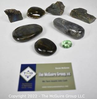 Group of Polished Stones Including One Loose 16Kt Green Peridot Gem Stone.