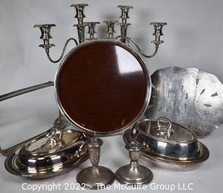 Group of Silver Plate Serving Pieces with Pair Weighted Sterling Silver Candlesticks.