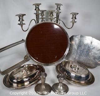 Group of Silver Plate Serving Pieces with Pair Weighted Sterling Silver Candlesticks.