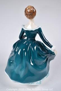 Royal Doulton Bone China Figurine  - Janine In Blue Gown Designed by J. Bromley. Issued 1971-1995. 8" tall.