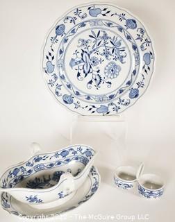 Three (3) Pieces of  Meissen Blue Onion Hand-Painted Porcelain Made in Germany Serving Pieces Including Dinner Plate, Gravy Boat and Salt and Pepper Dish.