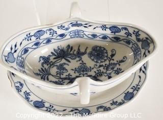 Three (3) Pieces of  Meissen Blue Onion Hand-Painted Porcelain Made in Germany Serving Pieces Including Dinner Plate, Gravy Boat and Salt and Pepper Dish.