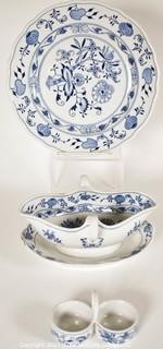 Three (3) Pieces of  Meissen Blue Onion Hand-Painted Porcelain Made in Germany Serving Pieces Including Dinner Plate, Gravy Boat and Salt and Pepper Dish.